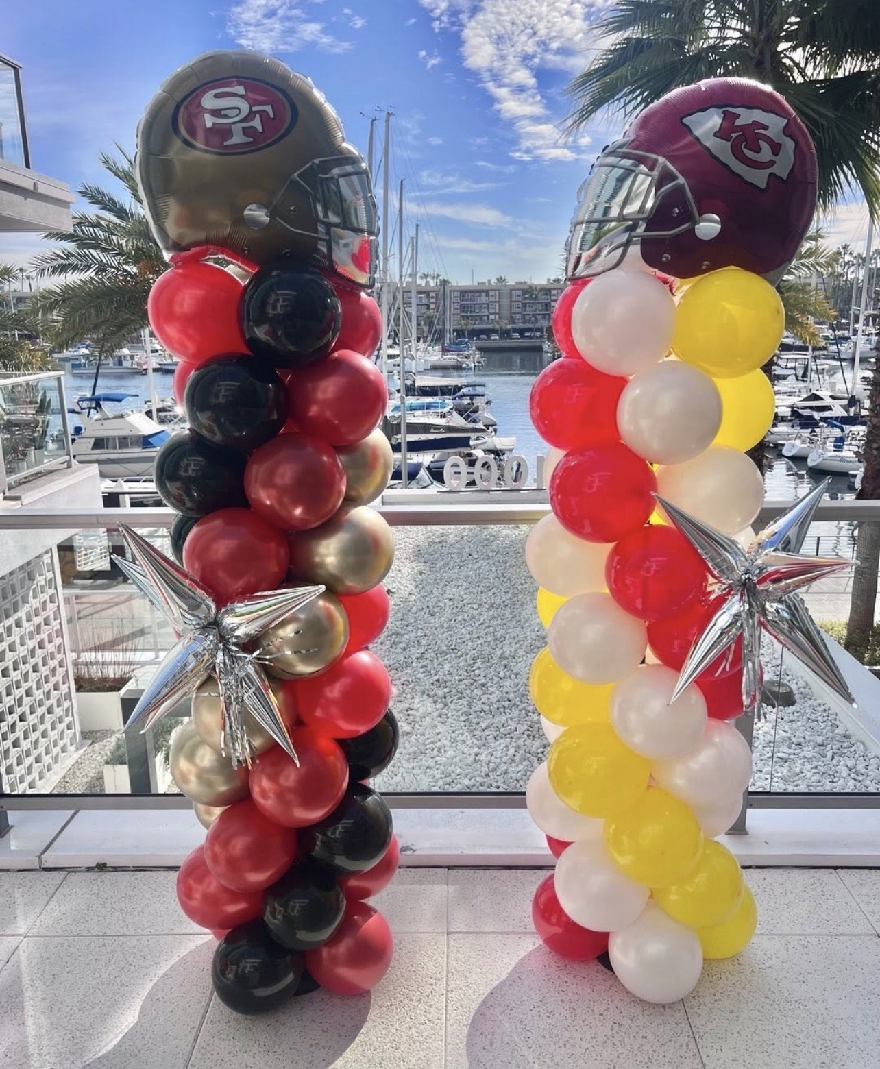 Football-themed balloon columns overlooking Marina del Rey